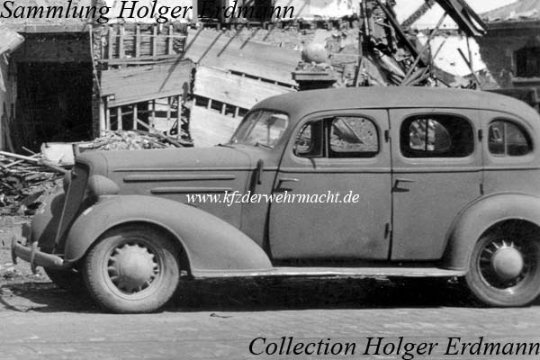 Chevrolet_1936_vor_zerst_Haus_Deynze